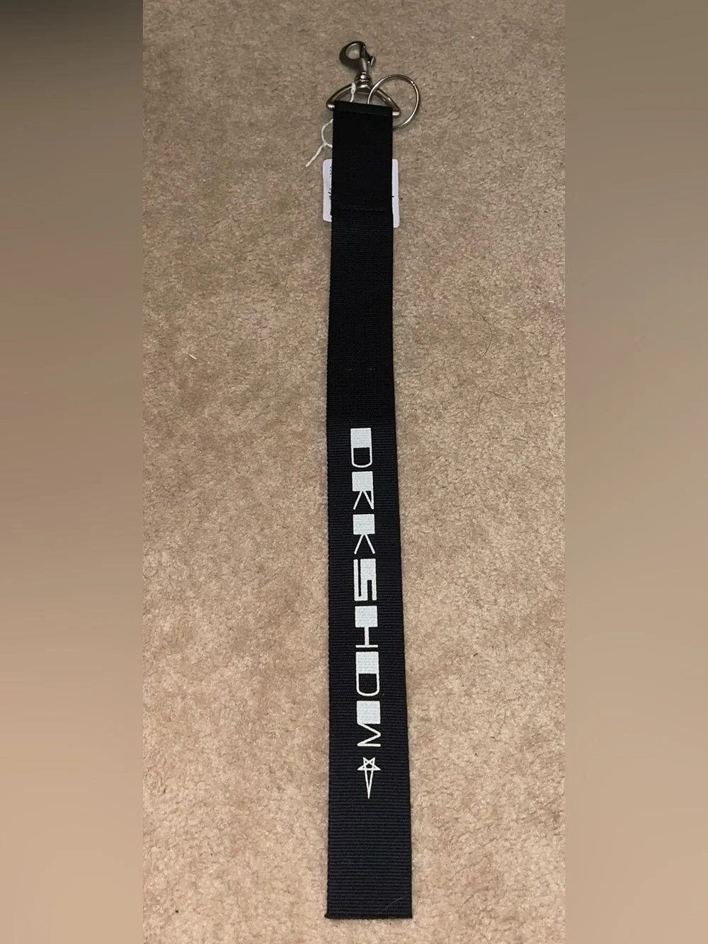 Rick Owens. Black Webbing keychain with White Logo